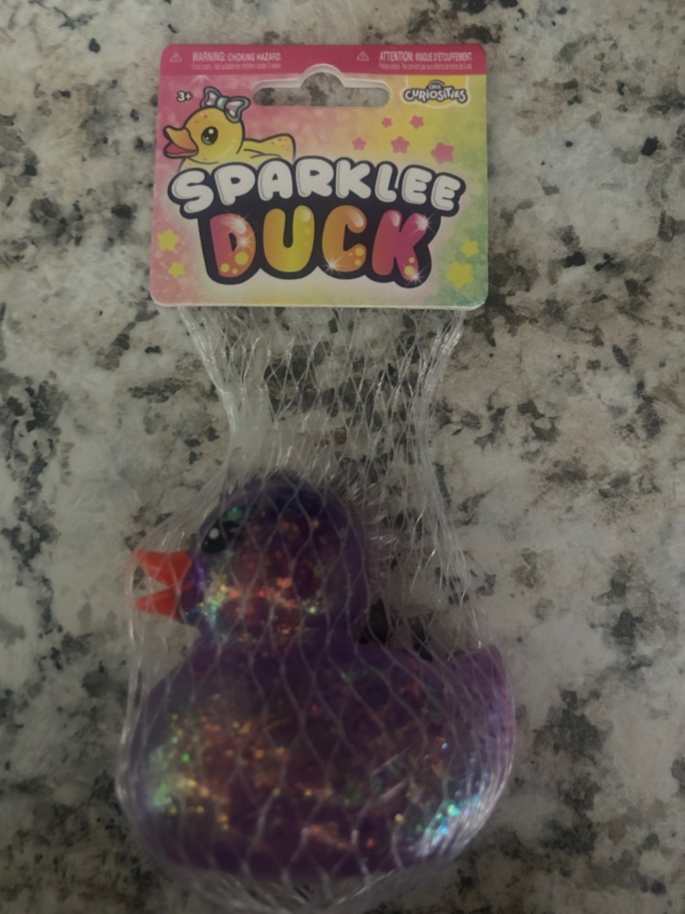 Orb Curiosities Purple Sparkly Duck Squishy Fidget Toy